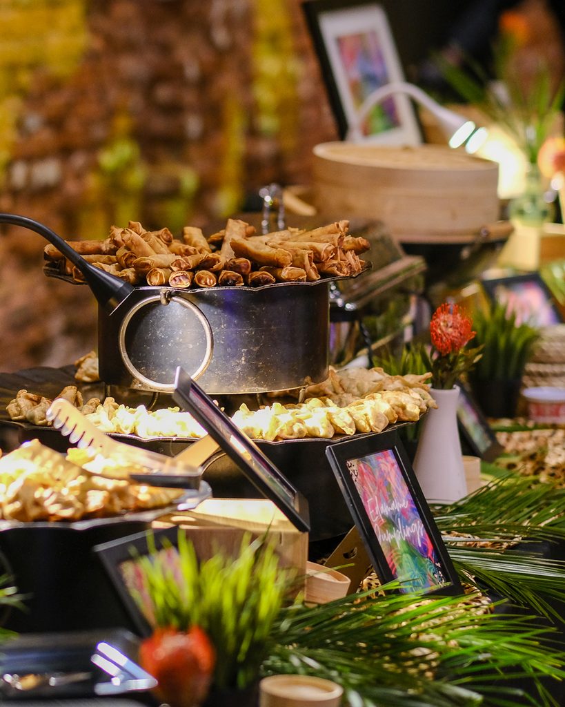 South Pacific culinary station with bamboo steamers at a large event at Armature Works