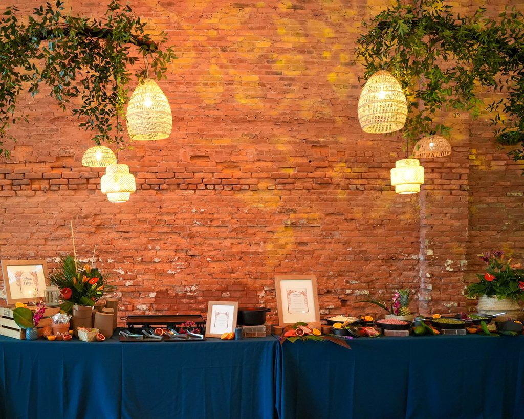 Good Food Events + Catering team serving guests at a large corporate event at Armature Works in Tampa