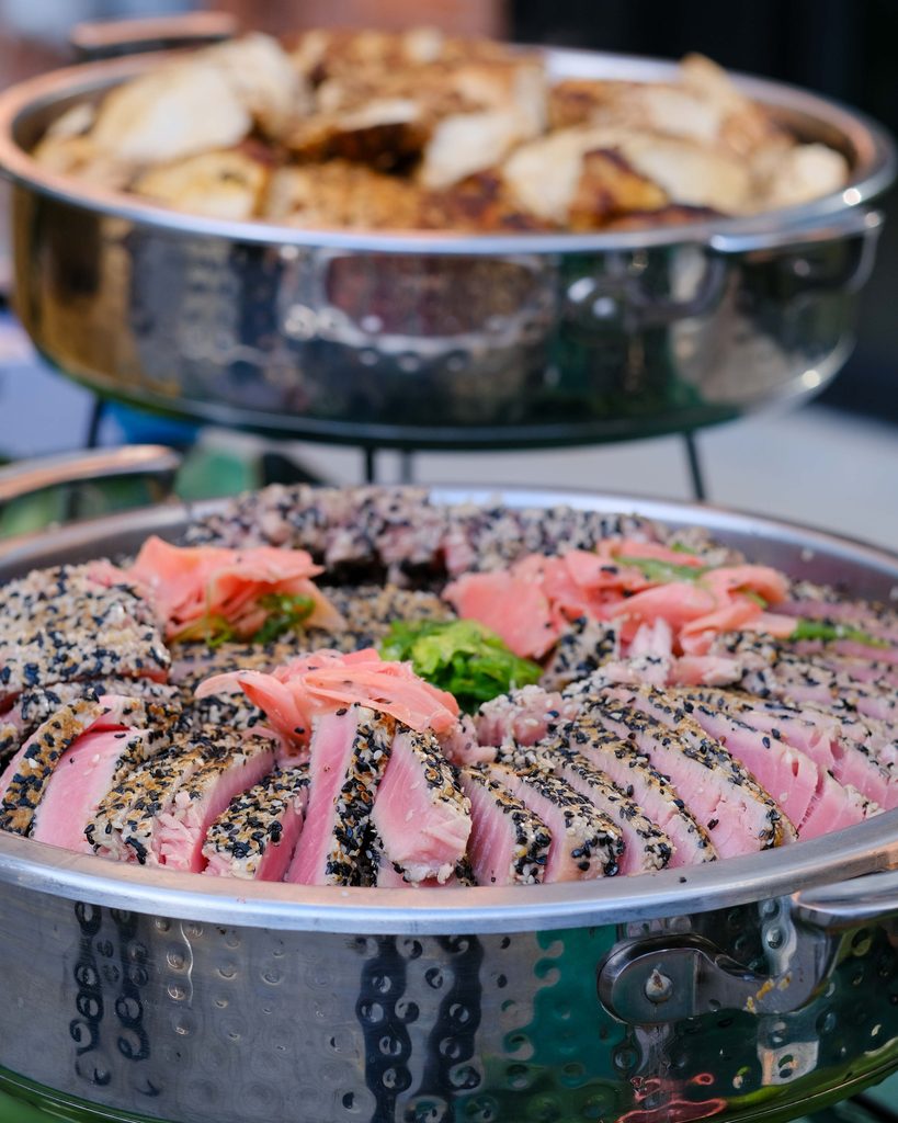 Seared ahi tuna prepared for the Fresh Bowl Station at an Armature Works corporate event